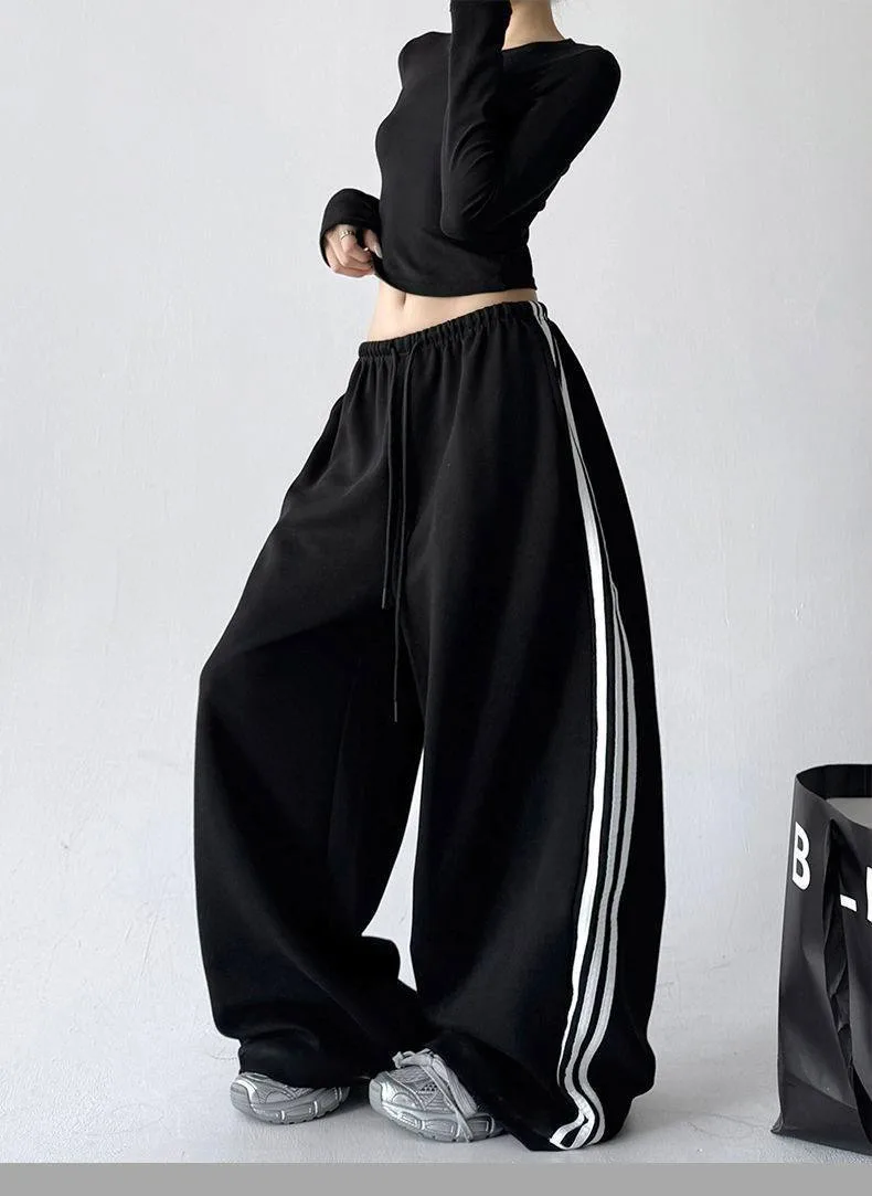 Штани жіночі oversize з лампасами, чорні — чорний